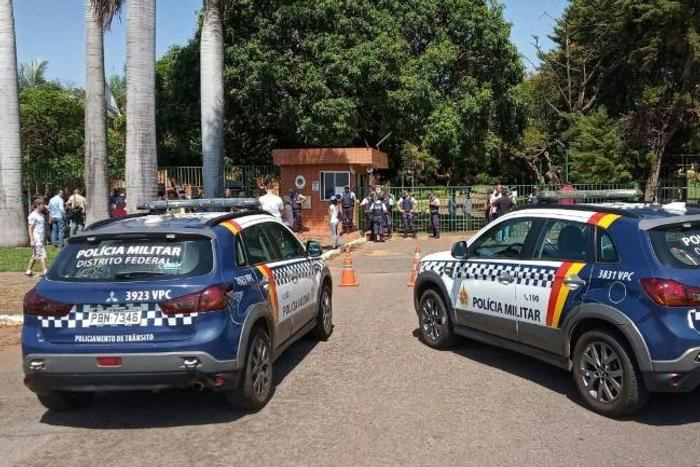 Military police patrol the surroundings of the Venezuelan embassy in Brasilia, Brazil, on November 13, 2019, while loyalists to President Nicolas Maduro and to Venezuelan opposition leader Juan Guaido face off inside the country's embassy