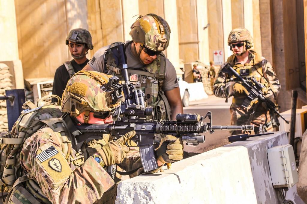 FILE PHOTO: U.S. Army soldiers from 1st Brigade, 25th Infantry Division, Task Force-Iraq, man a defensive position at Forward Operating Base Union III in Baghdad, Iraq, December 31, 2019. U.S. Army/Staff Sgt. Desmond Cassell/Task Force-Iraq Public Affa...
