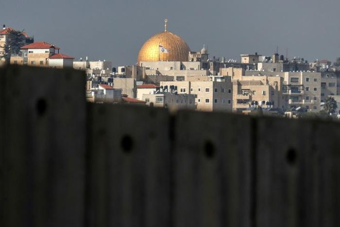 Jerusalem's iconic Dome of the Rock can be seen from Abu Dis -- but Israel's controversial barrier is in the way