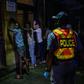 Police line up suspected lockdown violators in Johannesburg's Central Business District