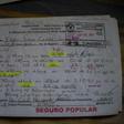 Mexican toddler Cristal Flores' prescriptions are seen on a table at her house, in Cuautitlan, Mexico