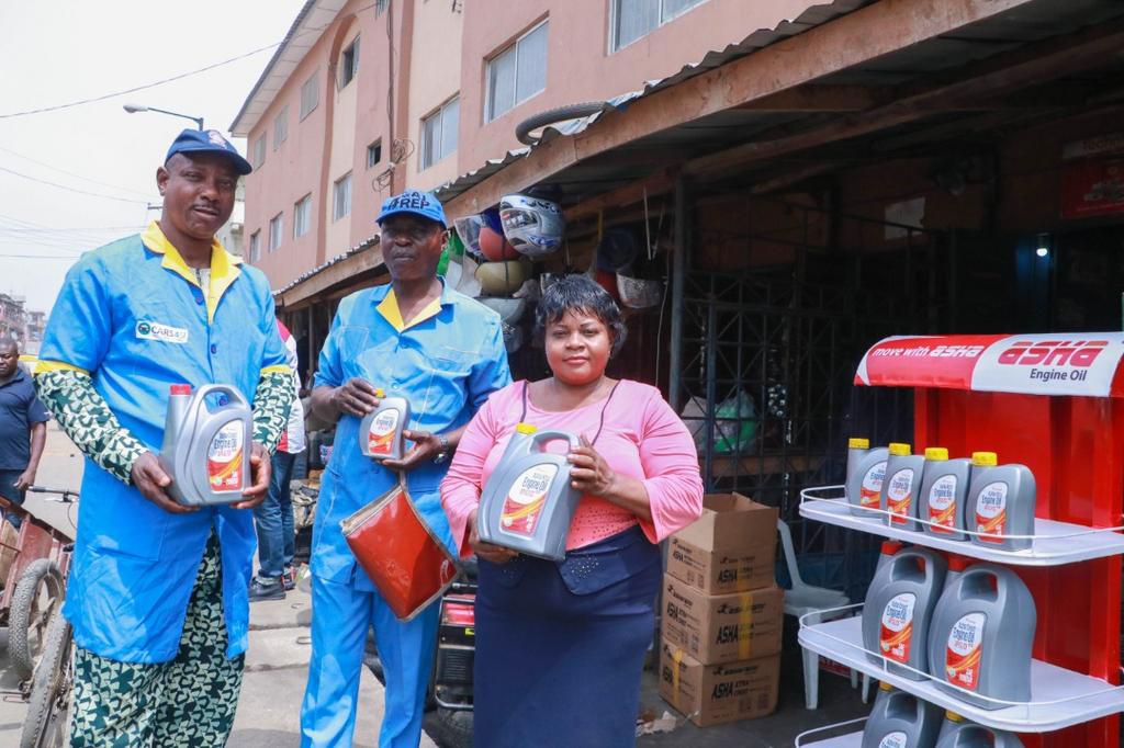 From left to right ( Management Team mechanic village visit to meet with distributor) Nigeria Automobile Technicians Association (NATA) Representatives Ranson Joint Ventures - First distributor for Asha Engine Oil during the market visitation