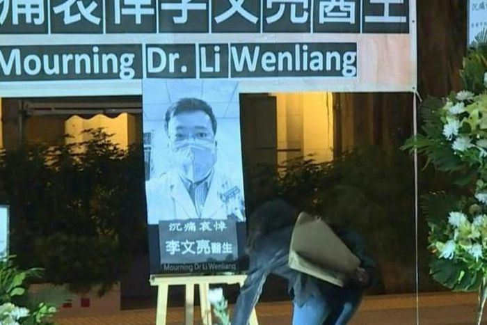 People attend a vigil in Hong Kong in honour of the Chinese doctor who raised the death alert for the coronavirus. The death of Li Wenliang, who had been punished for sounding the alarm about the emergence of this new virus, has unleashed great anger i...