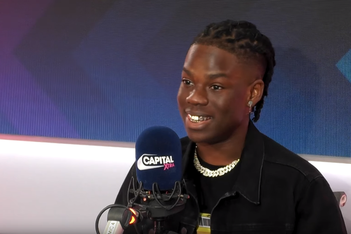 Rema talks about losing his dad and brother, why he makes music for the world and his love life. (YouTube/Rema)