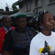 Naira Marley being led to court by men of the EFCC amidst a watertight security. [Twitter/@officialEFCC]