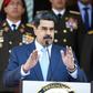 Venezuela's President Nicolas Maduro, in a handout picture released by Venezuela's presidential palace, has been indicted by the United States on "narco-terrorism" charges