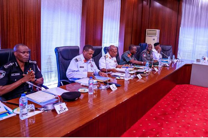President Muhammadu Buhari in a meeting with service chiefs (Punch)