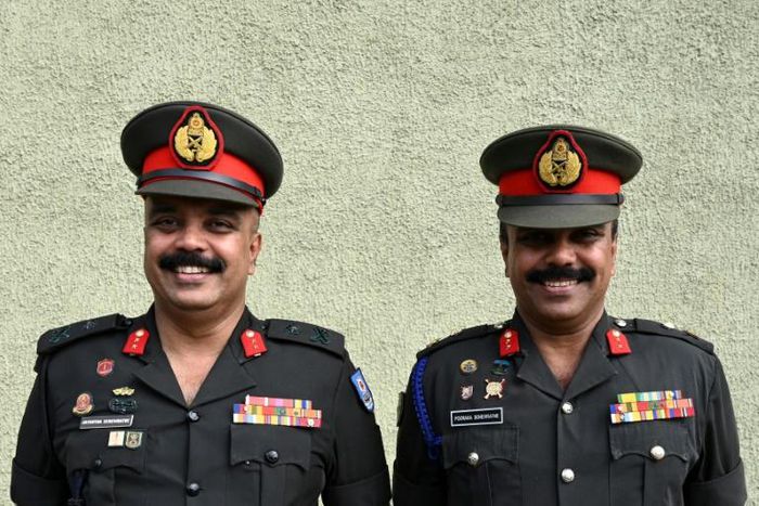 Twin Sri Lankan army generals Jayantha (L) and Pooraka (R) Seneviratne were among the thousands who turned up for the record attempt