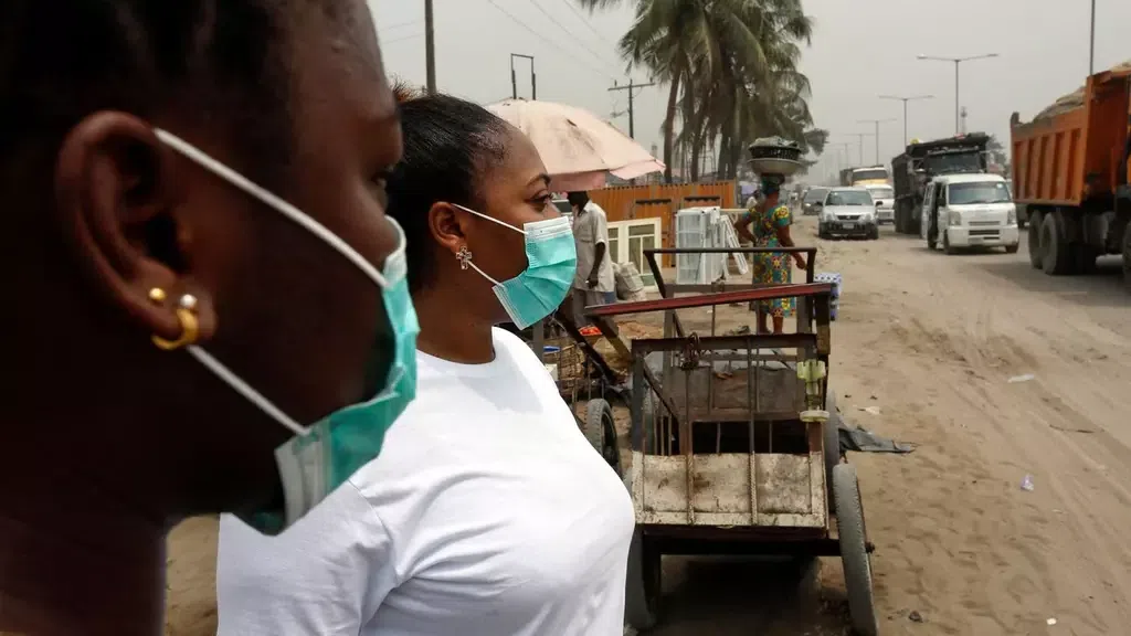 Ladies with nose mask to prevent against Coronavirus in Nigeria/Illustration (Washington Post)