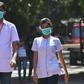 Medical staff wearing facemasks amid concerns of the spread of the coronavirus leave a hospital in Mumbai on March 12