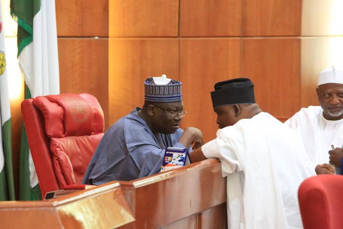 Senator Adeola Olamilekan Yayi conferring with President of the Senate, Sen. Ahmad Lawan on the First Plenary of the 9th Senate  [Twitter/@YAYIAdeola]