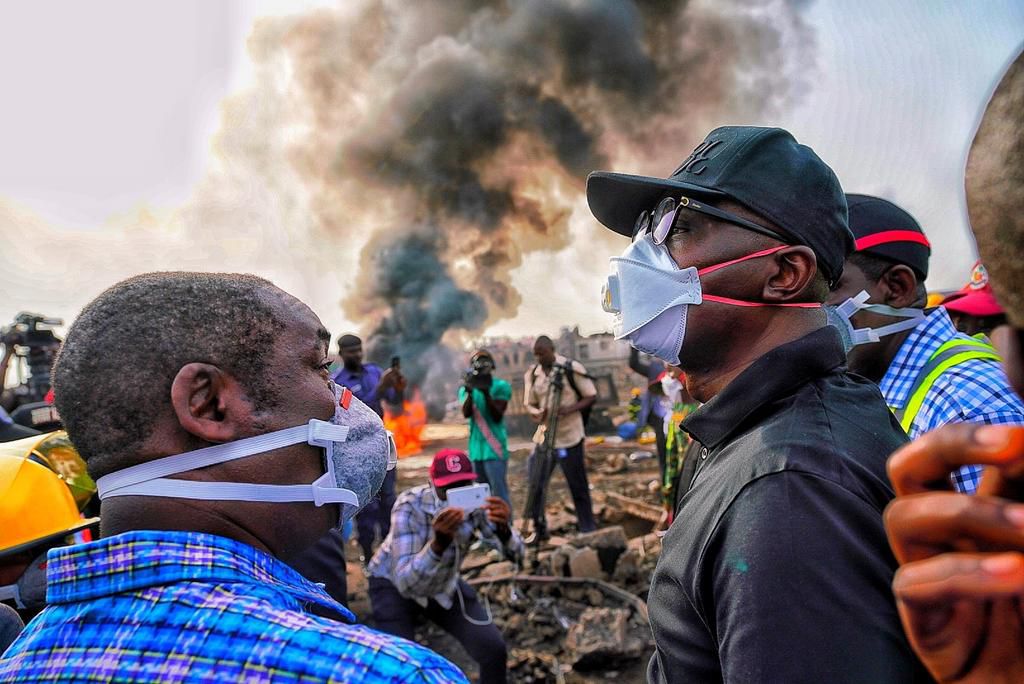 Governor Babajide Sanwo-Olu and his Deputy, Obafemi Hamzat visit the site of the tragic incident at the Abule Ado area of Lagos. [Twitter/@jidesanwoolu]