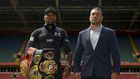 Britain's Anthony Joshua (L) and Bulgaria's Kubrat Pulev (R) pose at the Principality Stadium in Cardiff on September 11, 2017 during a promotional event for their heavyweight world title boxing match