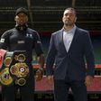 Britain's Anthony Joshua (L) and Bulgaria's Kubrat Pulev (R) pose at the Principality Stadium in Cardiff on September 11, 2017 during a promotional event for their heavyweight world title boxing match