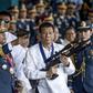 Philippine President Rodrigo Duterte's (C) signature anti-narcotics crackdown has killed thousands and drawn international condemnation