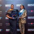 (Left) Miss Folasade Michael-Adenuga, Group Executive Director, Globacom, with the award of 'Entrepreneur of the Decade' won by Dr. Mike Adenuga Jr. and Mrs. Bella Disu, Executive Vice Chairman, Globacom, displaying the 'Brand of the Decade' award won ...