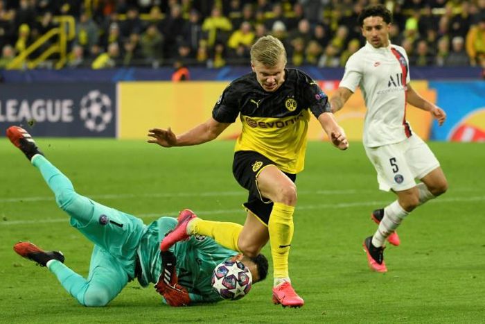 Dortmund's Norwegian forward Erling Braut Haaland (C) has now scored 11 goals in seven games for Borussia Dortmund.