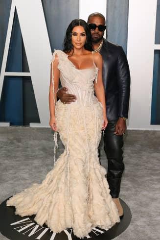 Kim Kardashian and Kanye West at the 2020 Vanity Fair Oscar party [Getty Image]