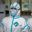 Medical workers wearing hazmat suits as prevention against the COVID-19 coronavirus at work at the Huanggang Zhongxin Hospital in Huanggang, in China's central Hubei province
