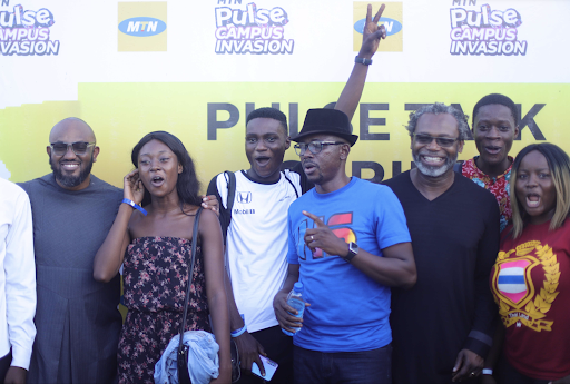 UNIBEN students taking pictures with the speakers after the Pulse Talk Series