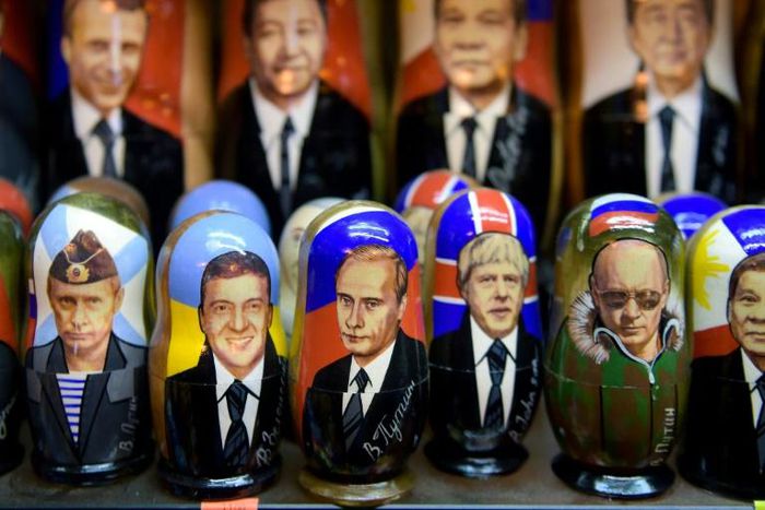 Whether it is commander-in-chief Putin looking through binoculars or mocked-up shirtless Putin riding a bear, the Russian president is on sale everywhere