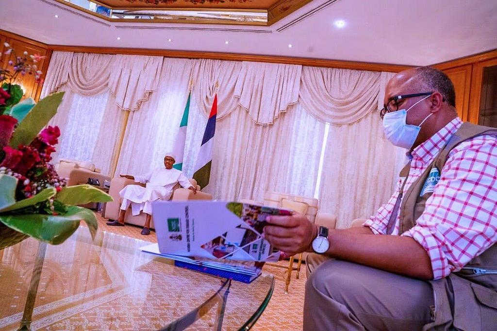 President Muhammadu Buhari and the Director General of the Nigeria Centre for Disease Control (NCDC), Dr Chikwe Ihekweazu. [Twitter/@BashirAhmaad]