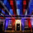 Red, white and blue lights illuminate 10 Downing Street, the official residence of Britain's Prime Minister, in central London after Britain left the European Union