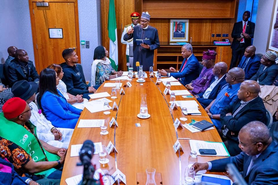 President Buhari with R-L: High Commissioner of Nigeria to UK Justice Adesola Oguntade, Foreign Affairs Minister Geoffrey Onyeama, Heavy Weight Champion Anthony Joshua, CEO of Diaspora Commission Abike Dabiri, Governor Inuwa Yahaya of Gombe State, Mini...