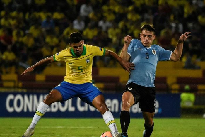 Bruno Guimaraes (L) has been callewd up to the senior Brazil squad
