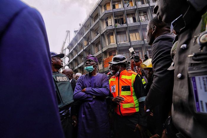 Governor Babajide Sanwo-Olu visits the scene of the fire incident at Balogun Market on Lagos Island. [Twitter/@jidesanwoolu]