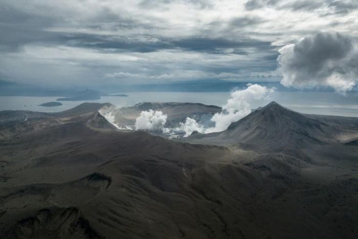 When Taal exploded to life it spewed towering columns of fine grey ash