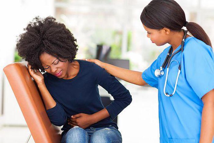 File photo: Woman with indigestion