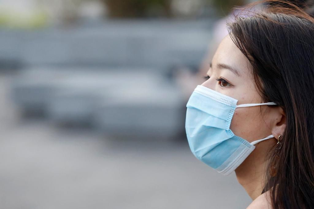 A woman wearing a face mask