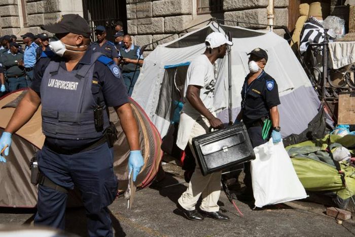 South African police forcibly removed migrants from a city square after months of tensions