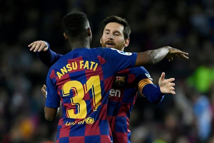 Ansu Fati (left) celebrates with Lionel Messi after scoring twice in Barcelona's win over Levante on Sunday.