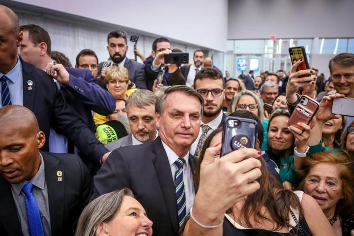 Brazilian President Jair Bolsonaro greets Miami's Brazilian community after an event at Miami Dade College's Medical Campus in Miami, Florida, on March 9, 2020