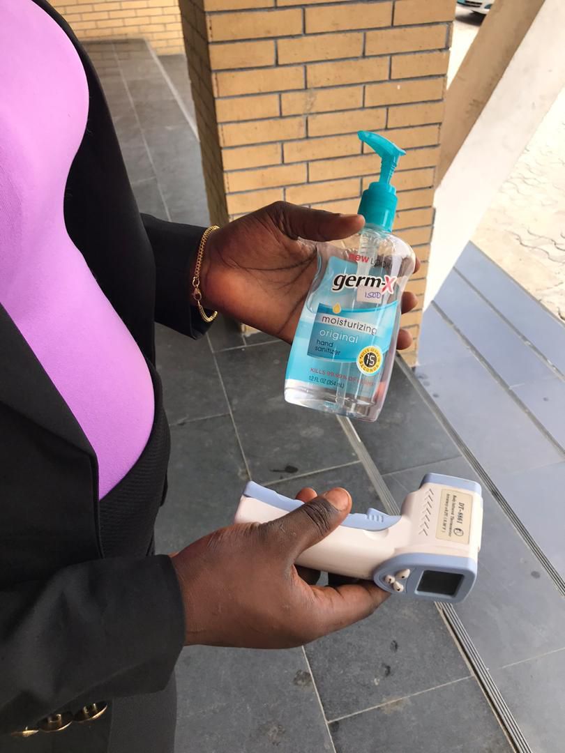 Hand sanitizer and temperature scanner at the Redeemed church in Okota, Isolo (Pulse)