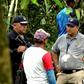 Grab taken from Panamanian channel TVN Noticias showing Panamanian police and employees of the Public Ministry near the site where a mass grave was found with seven bodies at the indigenous region of Ngabe Bugle, in Bocas del Toro province, Panama, on ...