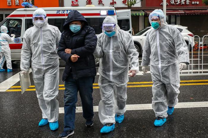 Wuhan China January 26 coronavirus medics help man