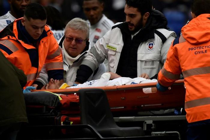 Martin Terrier was stretchered off after fainting during the first half of Lyon's game against Toulouse