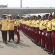 Gov. Babajide Sanwo-Olu of Lagos State adjusting the collar of one of the newly recruited officials of Lagos State Traffic Management Authority (LASTMA) during their passing out parade in Lagos on Wednesday (Twitter/@followlasg)