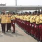 Gov. Babajide Sanwo-Olu of Lagos State adjusting the collar of one of the newly recruited officials of Lagos State Traffic Management Authority (LASTMA) during their passing out parade in Lagos on Wednesday (Twitter/@followlasg)