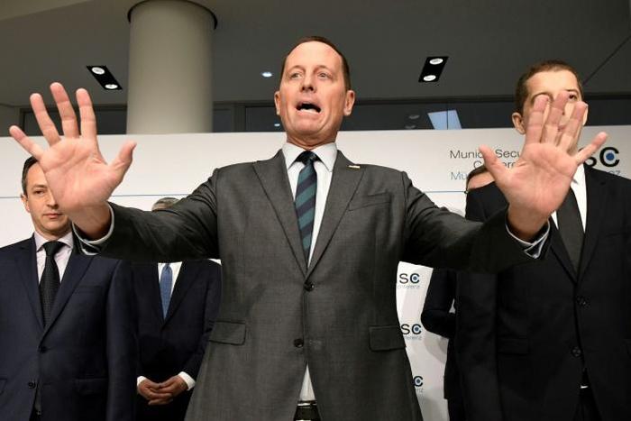 US Ambassador to Germany Richard Grenell (C, pictured February 14, 2020) said President Donald Trump told him that allies who use Huawei "will jeopardize our ability to share intelligence and information"