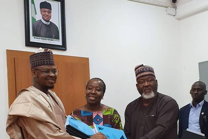 L-R: Dr. Isa Ali Ibrahim Pantami, Hon. Minister of Communications and Digital Economy; Ms Funke Opeke, Chief Executive Officer, Main One/Chairman, National Broadband Plan Committee 2020-2025, and Engr. Ubale Masks, Committee Secretary/Executive Commiss...