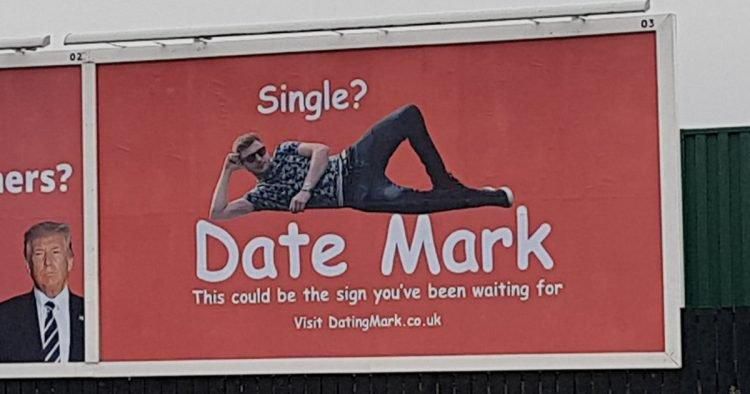 Tired single man resorts to billboard advertisement to find a suitor