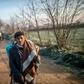 A migrant walks towards the Greek border on Sunday but he can't expect a warm welcome