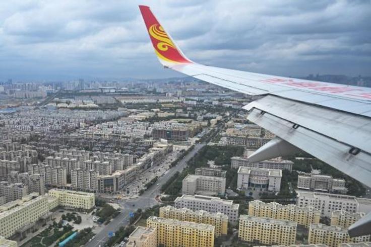 Xinjiang's capital Urumqi is seen from a passenger plane in September 2019
