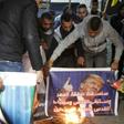 Palestinians oppose US President Donald Trump's Middle East peace plan, at a gathering in the Deheisheh refugee camp near the West Bank city of Bethlehem