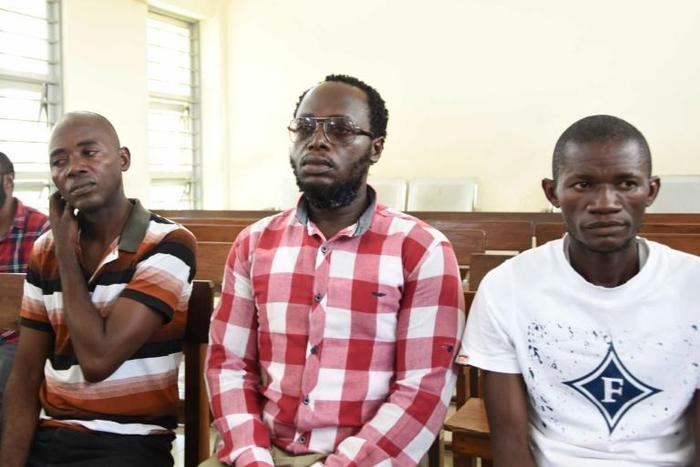 Tanzanian journalist Erick Kabendera (C), seen here in an earlier court appearance, was released after he pleaded guilty