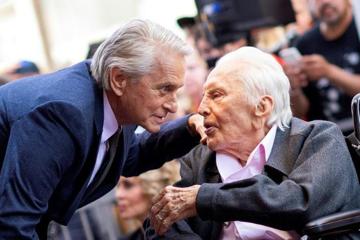 Kirk Douglas is survived by three sons, including the movie star Michael Douglas, pictured left with his father in 2018